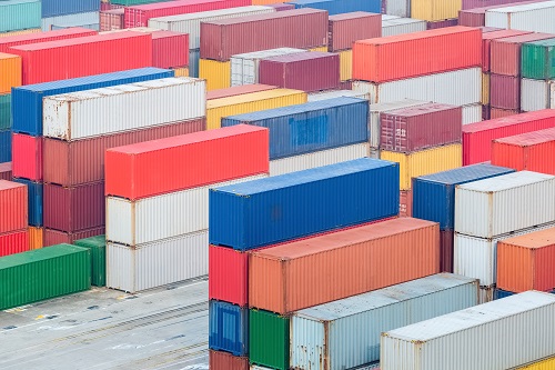 colorful containers in freight station, international trade background